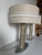An exceptional pair of authentic Bentley Home “Morpeth” table lamps, handcrafted in Italy by Luxury Living Group. These...