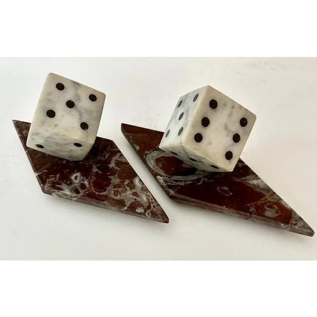 Pair of Marble Dice on Marble bases. The pair are a nice compliment to any shelf and great for the game aficionado or...