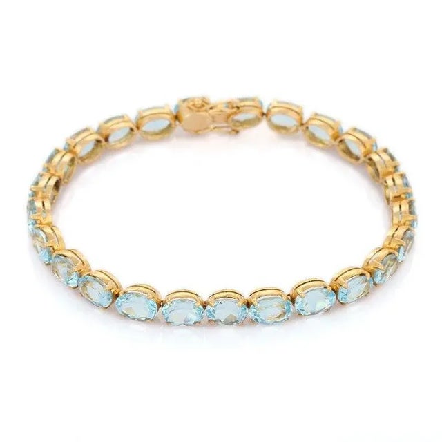 28.5 Carats Blue Topaz Gemstone Tennis Bracelet in 18k Yellow Gold For Sale - Image 4 of 17