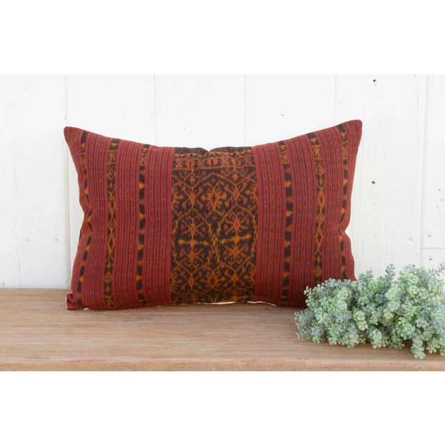 A magnificent antique Indonesian ikat ceremonial throw, now made into a one of a kind pillow. This antique ceremonial...