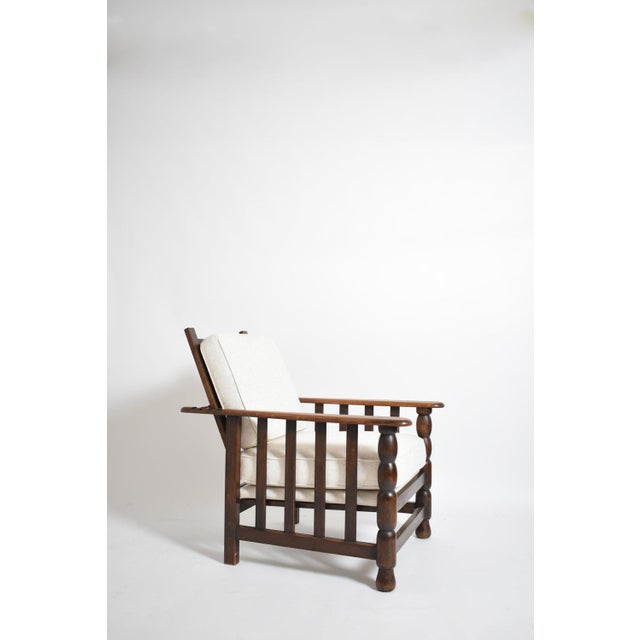 Dudouyt style oak armchair, 1940s. Height: 90 cm - 35.43 in Length: 65 cm - 25.59 in Width: 93 cm - 36.61 in Seating...