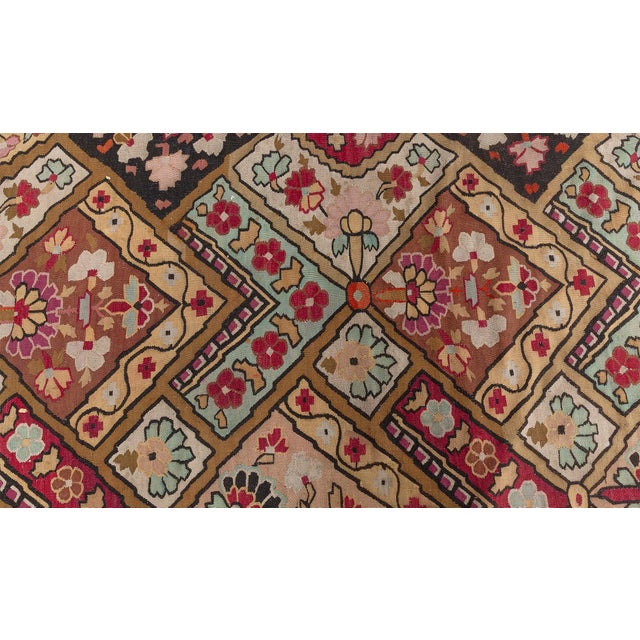 Step into a romantic 19th-century garden with this enchanting French Aubusson rug from the 1880s, masterfully woven in...