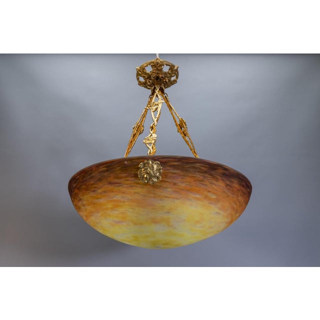 French art nouveau pâte de verre pendant by muller frères, circa 1920. atmospheric pendant light featuring a hand-crafted...