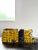 Whimsical and charming, hand-carved and hand-painted Folk Art lion sculpture. Vivid canary yellow paint with natural age-...