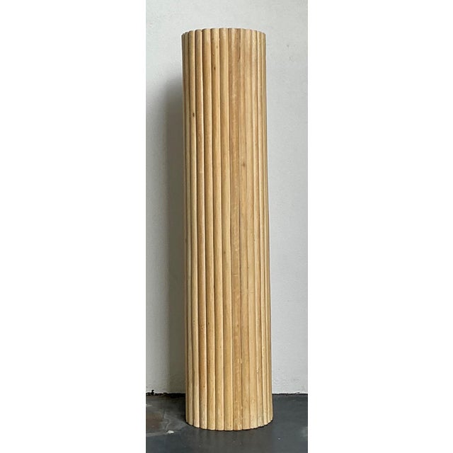 This stately vintage pedestal is an architectural masterwork, seamlessly blending organic materials with a rhythmic,...