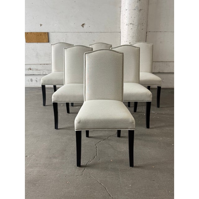 Design Plus Gallery presents a Set of Six Allison Dining Chairs from Sole Designs. Each chair showcases a tall upholstered...