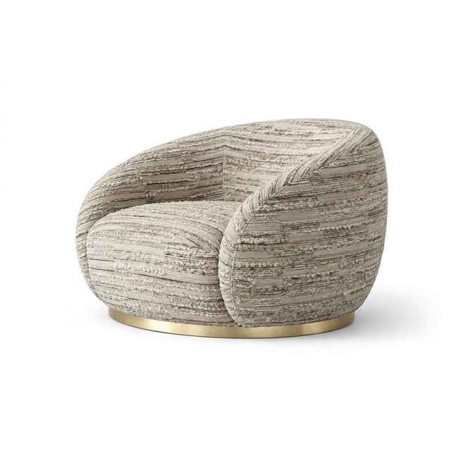White Chenille Swivel Chair with Brass-Finish Base. A pause made object. Tregua is designed to slow things down — to...