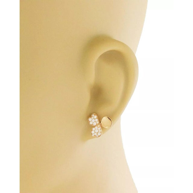 From Tiffany & Co. Paper Flower Collection are these adorable stud earrings, they feature a 3 petals flower, they show 2...