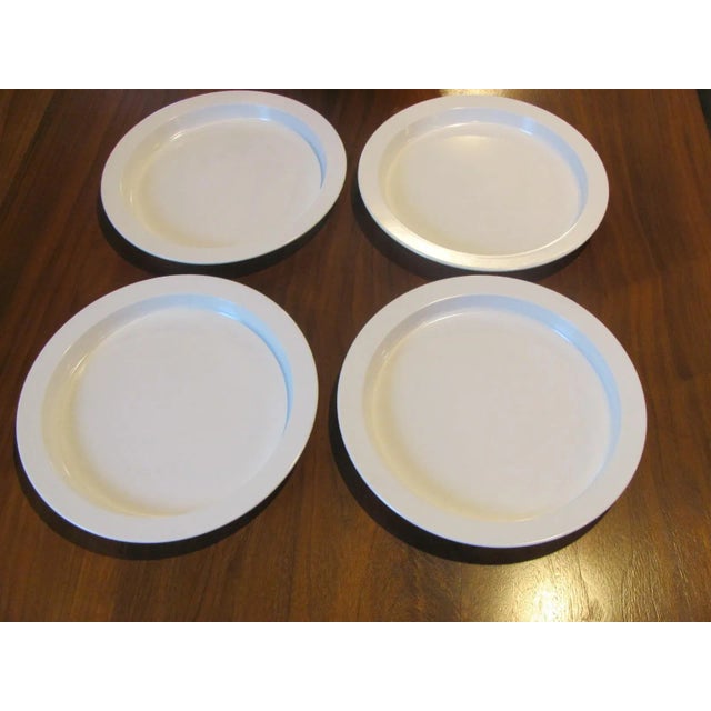 Nice set of 4 Dansk International Design White plastic 10.4" diameter dinner plates. Very good condition. Minor wear on...