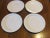 Nice set of 4 Dansk International Design White plastic 10.4" diameter dinner plates. Very good condition. Minor wear on...