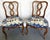 Pretty pair of vintage pretzel back chairs from the early 20th century. These solid wood chairs have a ribbon or pretzel...