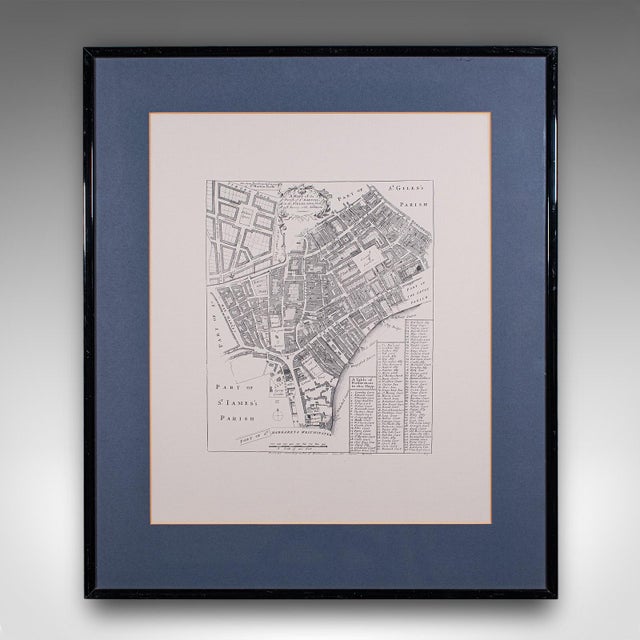 This is a vintage 18th century street map of London. An English, framed reproduction showing the parish of St Martin's In...