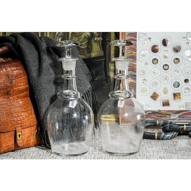 These impressive 19th-century antique glass decanters are striking examples of period craftsmanship, combining refined...