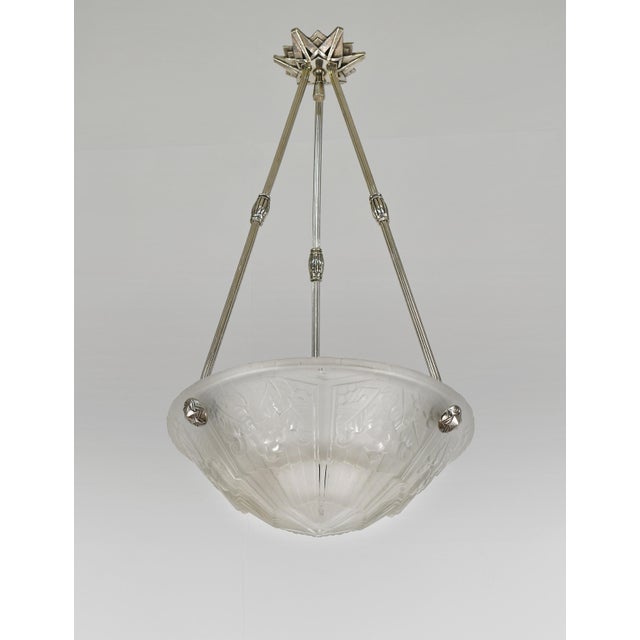 MAYNADIER A rare French 1925-1930 art deco chandelier in nickel plated solid brass or bronze by Maynadier. The Paris...