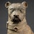 An imposing animal sculpture in patinated terracotta, depicting a seated guard dog with a vigilant gaze and dignified...