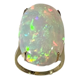 14 Carat Oval Shape Ethiopian Opal Cocktail Ring 14 Karat Yellow Gold For Sale