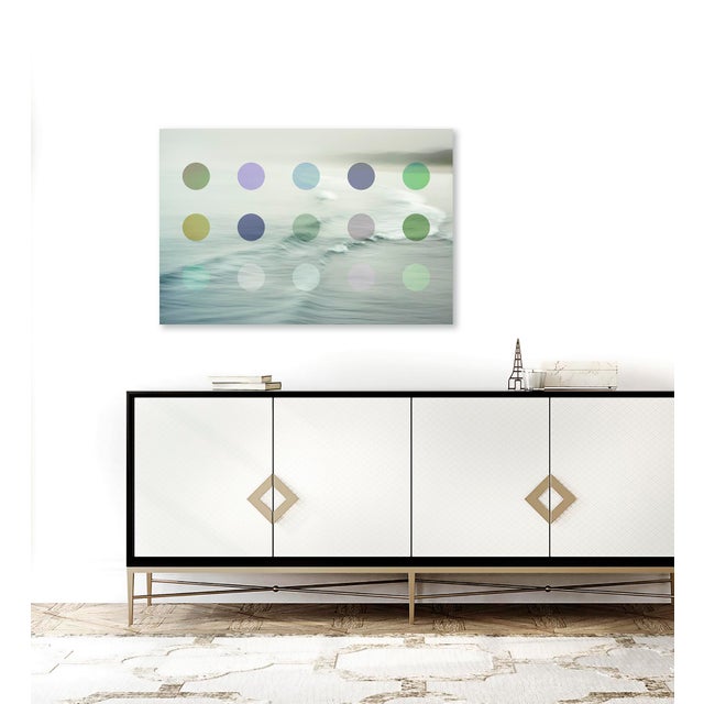 Cameron's unique seascape fine art is more modern with colourful dots added with symmetry. The vintage hues add a warth...