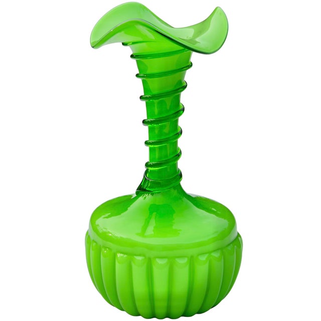 Gorgeous midcentury hand-blown art glass vase, featuring a remarkable sleek silhouette in color green with ornate textured...