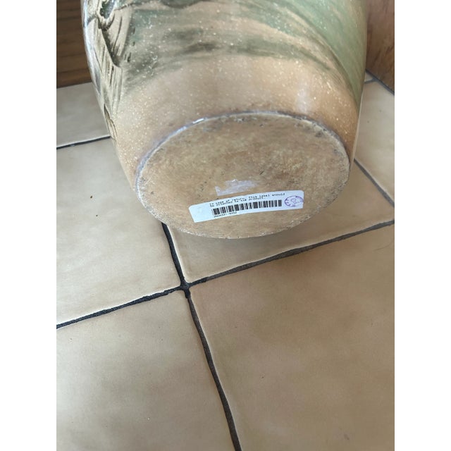 This is a rare Maitland smith piece with a wood top. Painted design on the ceramic