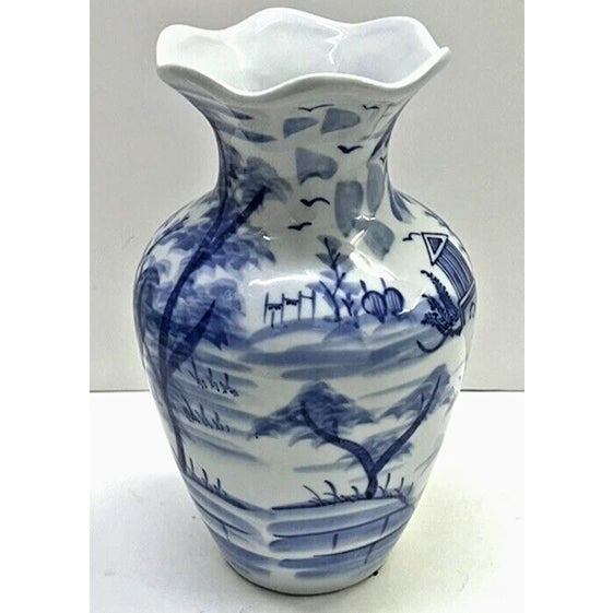 Add timeless elegance to your space with this beautiful vintage Chinese blue and white porcelain vase. Standing...