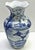 Add timeless elegance to your space with this beautiful vintage Chinese blue and white porcelain vase. Standing...