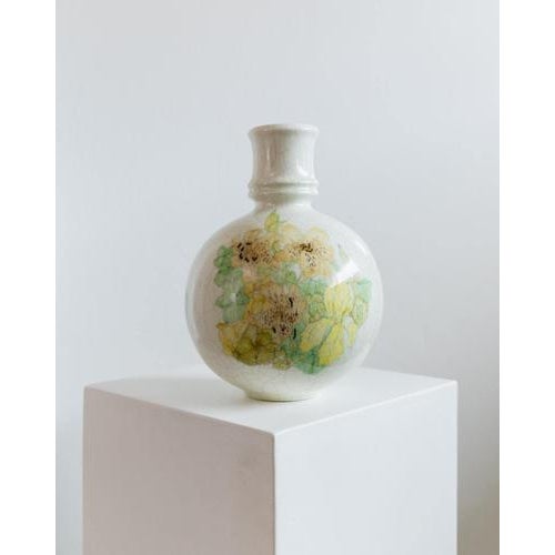 This vintage ceramic vase from the 1960s by Ernestine, Italy features a beautifully rounded form adorned with a vibrant...