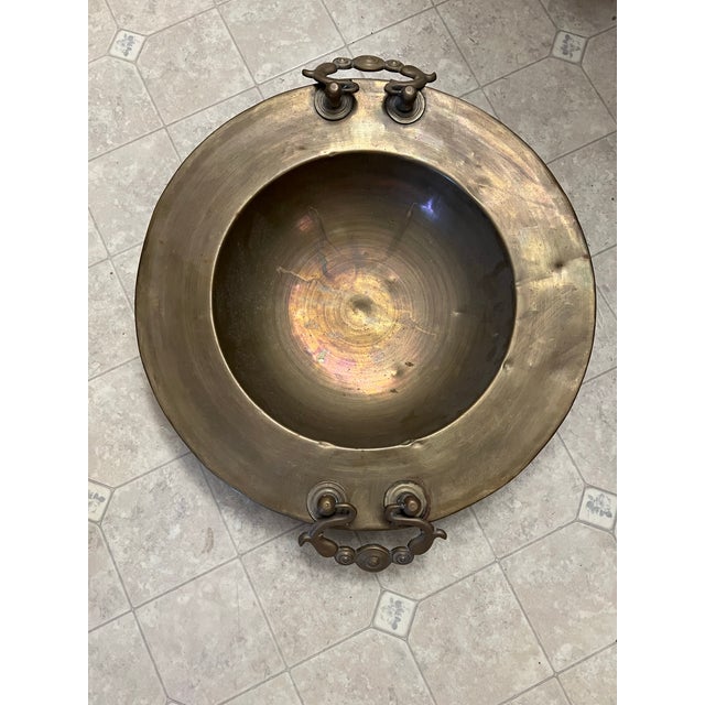 Large vintage Turkish bowl. Measuring 22.5” x 28” on handle sides . The bowl is 4” thick but with the handle attachments...