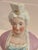 Add a touch of timeless romantic charm to your vanity, boudoir, or curation shelf with this exceptional antique figural...