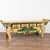 19th-century Chinese altar or console table crafted in elmwood, retaining its original yellow lacquered finish. The table...