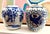 A charming pair of petite blue‑and‑white porcelain jars, each measuring 4" wide and 4.25" tall. These small jars feature...