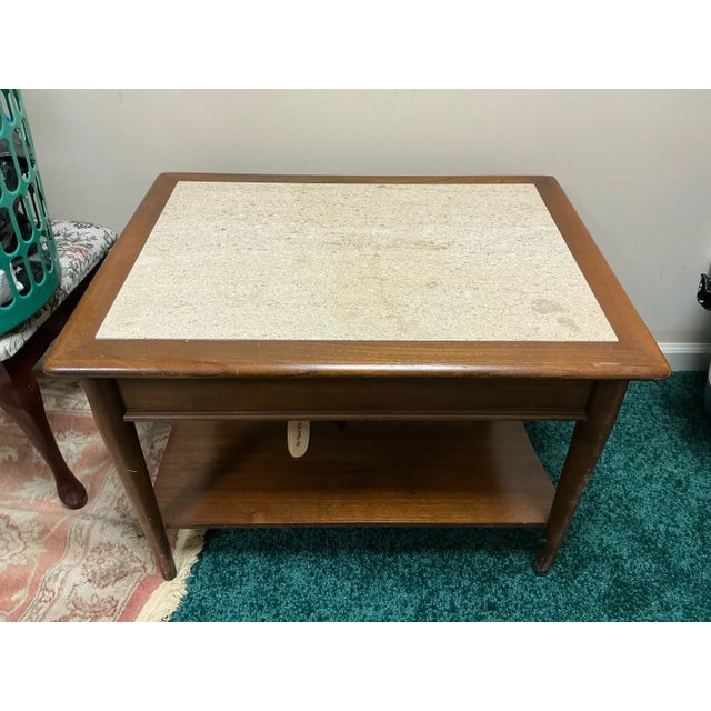 Add a touch of 1960s sophistication to your space with this authentic Lane Furniture "Perception" end table, designed by...