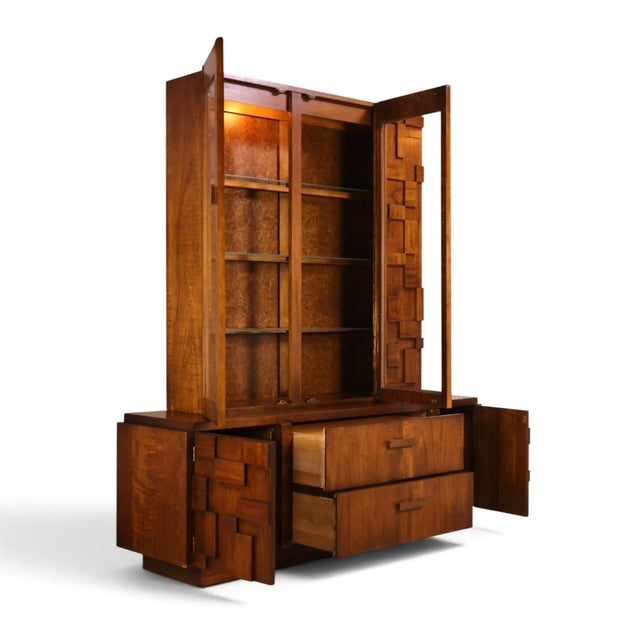 This 1970s Lane Staccato china cabinet is one of the more graphic designs the company produced, built around the...