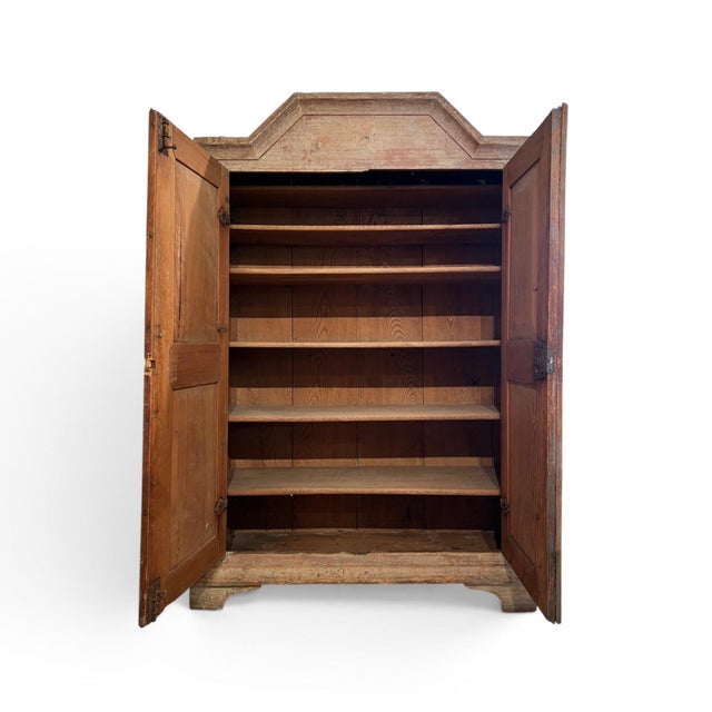 A timeless example of Swedish Gustavian craftsmanship, this 18th-century cabinet features elegant proportions, clean...