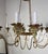 Melissa Levinson Miamar Twelve-Light Wrought Iron Chandelier With Gilt Finish For Sale - Image 4 of 9