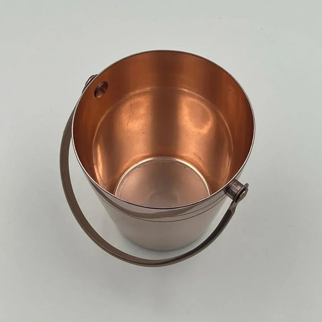 Dive into the retro charm of the Fifties with this iconic Ettore Sottsass‘ 50s Ice Bucket produced by Rinnovel. Crafted...