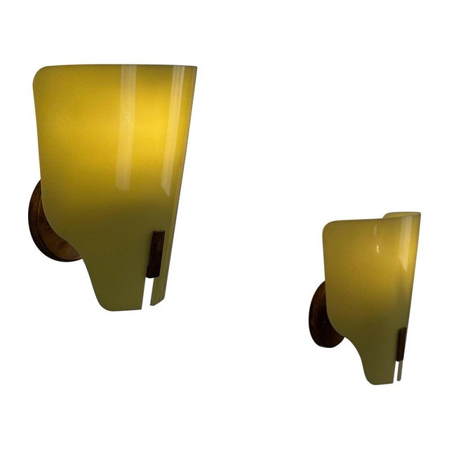 Discover this rare pair of model 157/px wall lights designed by gino sarfatti for arteluce in the 1960s — a striking...