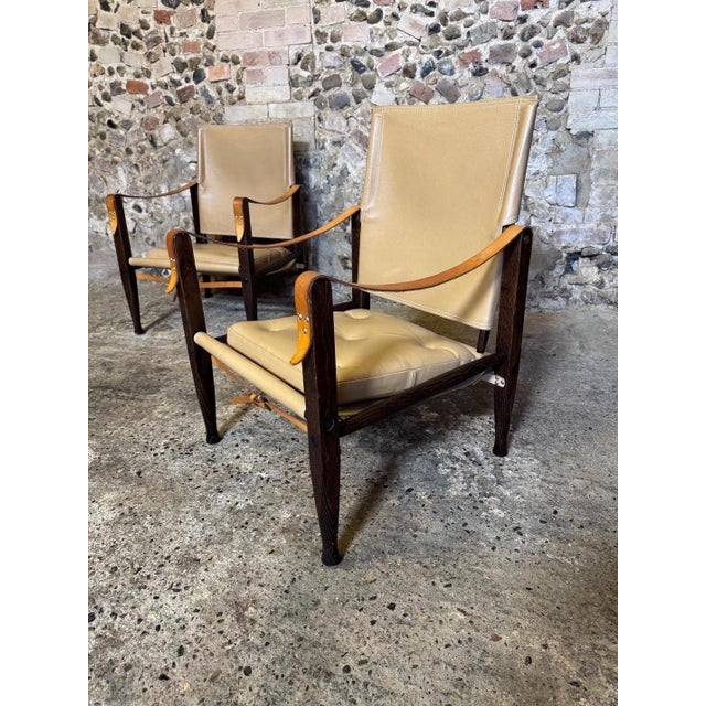 Fantastic pair of 21st iconic safari chairs designed by Kaare Klint. Produced by: Carl Hansen & Søn, Denmark. Model No....