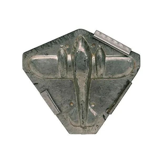 Vintage airplane chocolate mold. Stamped with Eppelsheimer & Co., New York spinning top logo, also stamped "MADE IN USA...