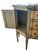 This demi-lune chest of drawers features three drawers, with small cabinets on either side. It stands on delicate, yet...