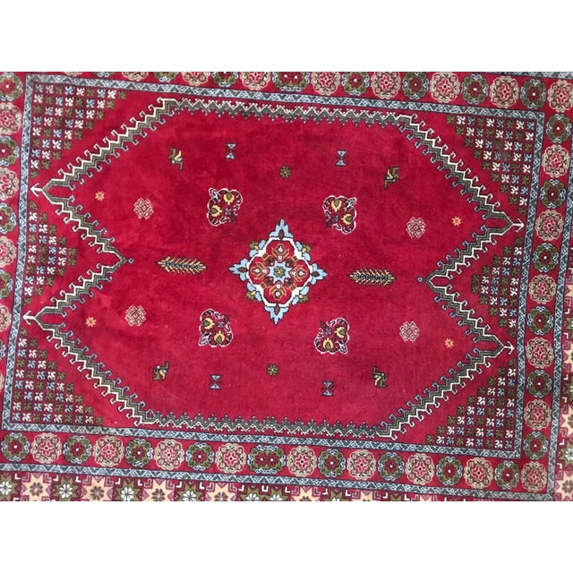 Nice 20th century Moroccan rug with beautiful geometrical design and red field color with blue and green, entirely hand...