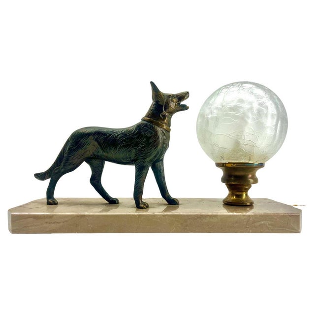 Stunning French Art Deco table lamp Gorgeous glass globe shade. with Spelter Dog motif. Sitting on a marble base. In...