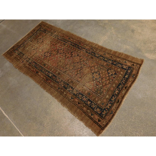 Circa 1900. Geometric motifs on a camel field.