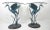 Stunning pair of cast metal side tables featuring Egrets wading amongst water grasses with wings outstretched. Birds are...