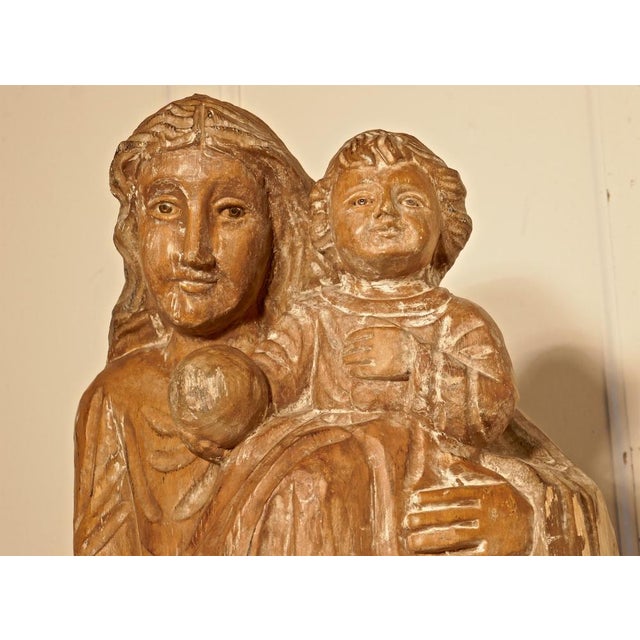 18th century French carved statue of Madonna and Child. This charming piece has been rescued from a ecclesiastic clear out...