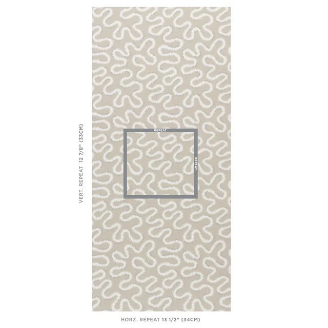Inspired by a historic document print, Zoelie wallpaper in natural is a modern take on a traditional vermicelli motif....