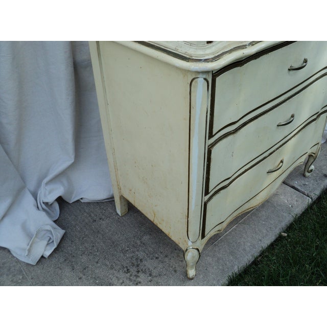 Up for sale is a stunning, authentic mid-century chest-on-chest highboy dresser manufactured by the renowned Dixie...