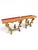 A rare and fine pair of 18th century Venetian giltwood console tables, each featuring a rectangular red-painted wood top...