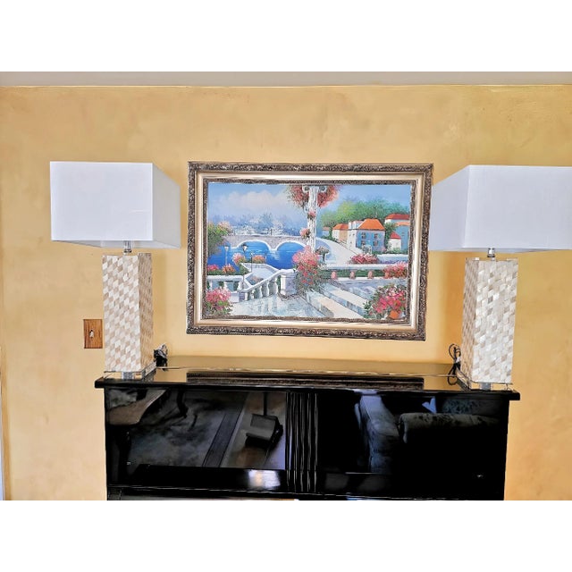 Add a touch of elegance to your home with this set of two Verna seashell LED table lamps by JONATHAN Y. The lamps feature...