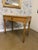 This is a English pine side table or great desk with storage drawer, resting on four lovely turned legs. The warm patina...
