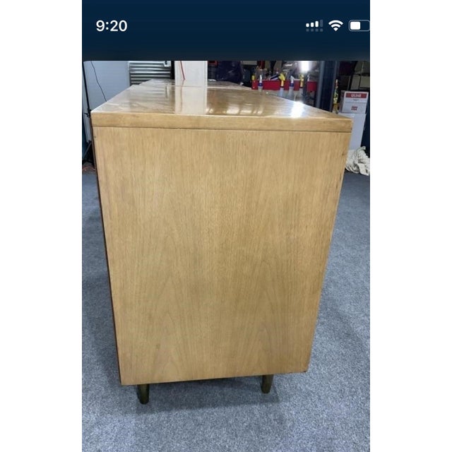 A pair of mid-century John Stuart 3-drawer chests, the perfect size to be versatile design work horses in any home. Use as...